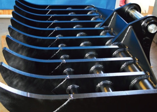 Rack per la pulizia di escavatori di forma standard con righe di acciaio resistenti